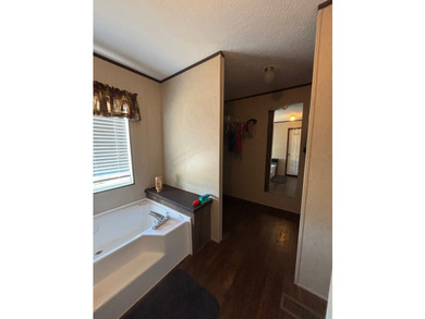Spacious 4BR/2BA home situated on a 0.69-acre lot offering - photo 16