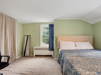 Welcome home to this charming Cape nestled in a sought-after - photo 19