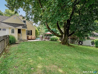 Welcome home to this charming Cape nestled in a sought-after - photo 32
