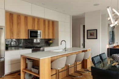 Bespoke. Elevated. Unexpected. The kind of urban residence that - photo 8