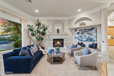 Tucked within the secluded Guard Gated Biltmore Hillside