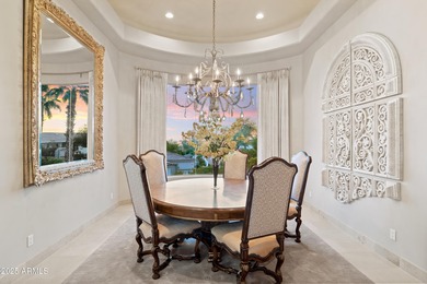 Tucked within the secluded Guard Gated Biltmore Hillside