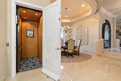 Tucked within the secluded Guard Gated Biltmore Hillside