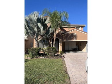 Lake Home For Sale in Coconut Creek, Florida