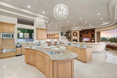 Tucked within the secluded Guard Gated Biltmore Hillside