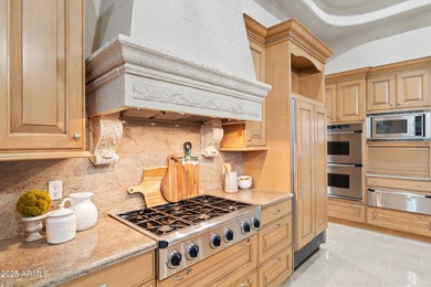 Tucked within the secluded Guard Gated Biltmore Hillside