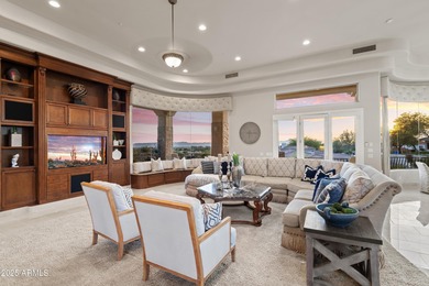 Tucked within the secluded Guard Gated Biltmore Hillside