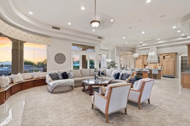 Tucked within the secluded Guard Gated Biltmore Hillside