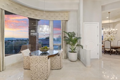 Tucked within the secluded Guard Gated Biltmore Hillside