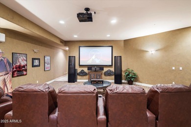 Tucked within the secluded Guard Gated Biltmore Hillside