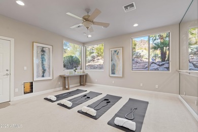 Tucked within the secluded Guard Gated Biltmore Hillside