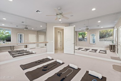 Tucked within the secluded Guard Gated Biltmore Hillside