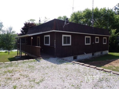 Lake Home For Sale in Brohman, Michigan