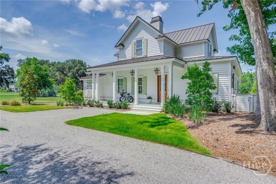 With a premier waterfront setting on tranquil Lake Dye, this - photo 2