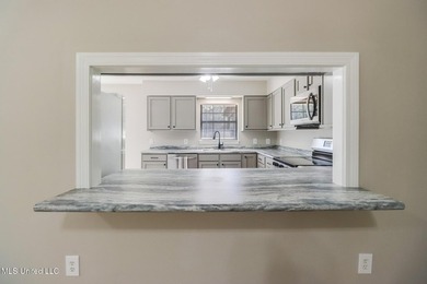 Welcome home to this beautifully updated 3-bedroom, 2-bath - photo 9