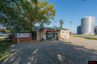 This exceptional commercial property presents an outstanding