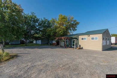 This exceptional commercial property presents an outstanding