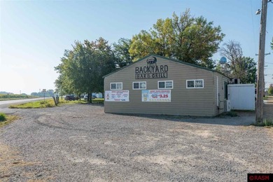 This exceptional commercial property presents an outstanding