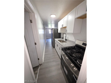Prime opportunity to add this renovated 5-unit asset to your - photo 13