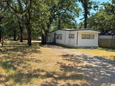 Lake Home For Sale in Pelican Bay, Texas