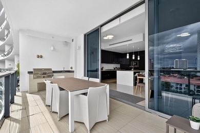 Experience luxury living in the heart of Aventura! This - photo 13