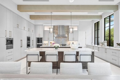 Located in the prestigious Royal Palm Yacht & Country Club, this - photo 15