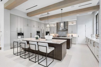 Located in the prestigious Royal Palm Yacht & Country Club, this - photo 17
