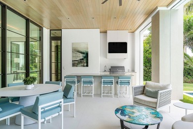Located in the prestigious Royal Palm Yacht & Country Club, this - photo 21