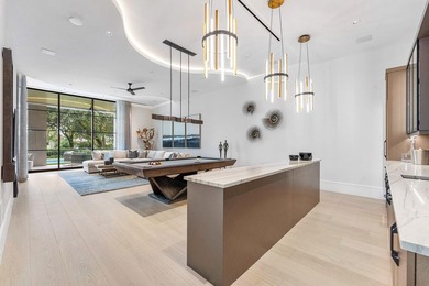 Located in the prestigious Royal Palm Yacht & Country Club, this - photo 32
