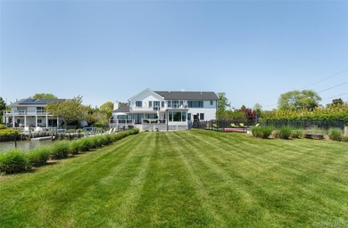 Set on 0.63 acres with waterside pool and 110Ft of bulkhead - photo 35