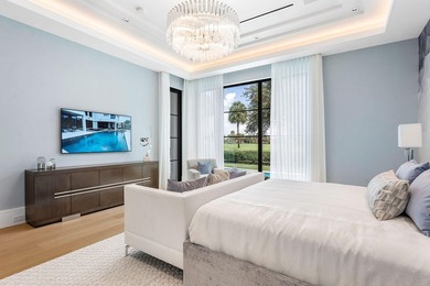 Located in the prestigious Royal Palm Yacht & Country Club, this - photo 38