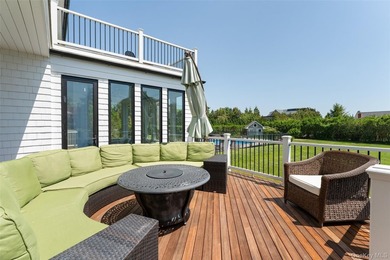 Set on 0.63 acres with waterside pool and 110Ft of bulkhead - photo 46