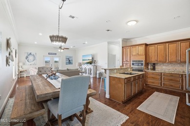 This beautifully maintained elevated waterfront home located in