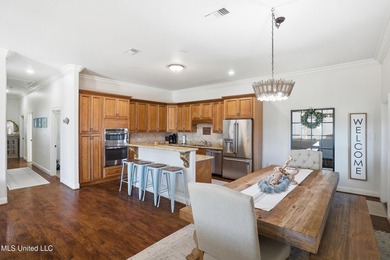 This beautifully maintained elevated waterfront home located in