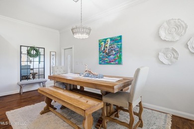 This beautifully maintained elevated waterfront home located in