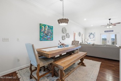 This beautifully maintained elevated waterfront home located in