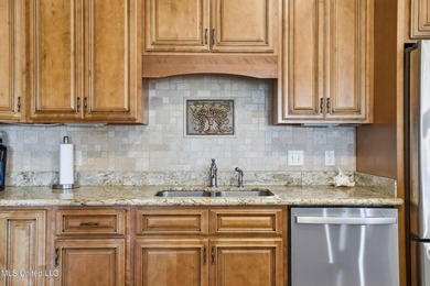 This beautifully maintained elevated waterfront home located in