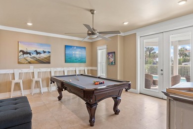 Beautifully furnished luxury home features 15-foot ceilings in - photo 12