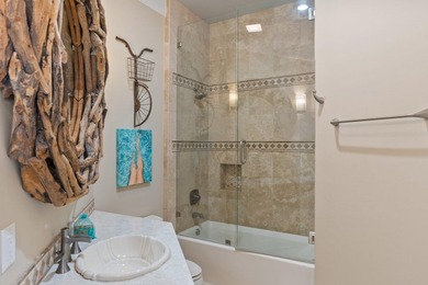 Beautifully furnished luxury home features 15-foot ceilings in - photo 46