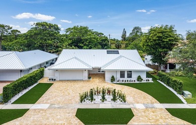Set on one of the neighborhood's most impressive lots, this - photo 1