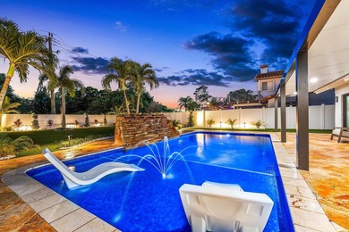 Set on one of the neighborhood's most impressive lots, this - photo 3