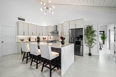 Set on one of the neighborhood's most impressive lots, this - photo 6