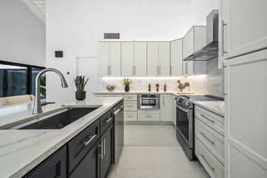 Set on one of the neighborhood's most impressive lots, this - photo 9