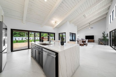 Set on one of the neighborhood's most impressive lots, this - photo 10