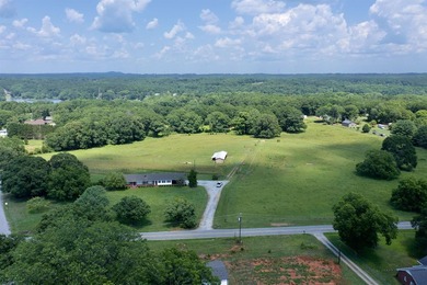 33.25 ACRES ON LAKE BLALOCK- A RARE OPPORTUNITY! Discover the - photo 1