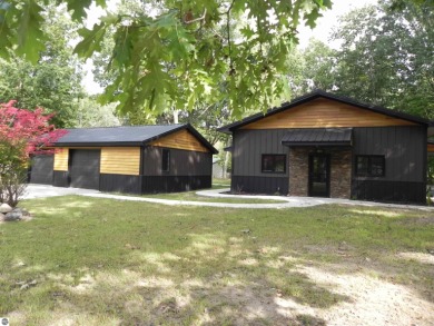 Lake Home For Sale in Weidman, Michigan