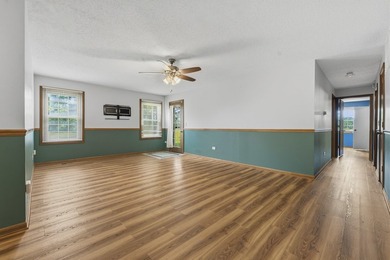 Enjoy easy main-floor living with beautiful golf course views - photo 2