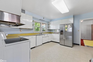 *The Pheasant House on Main* Step into timeless charm with this - photo 8
