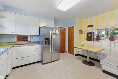 *The Pheasant House on Main* Step into timeless charm with this - photo 9