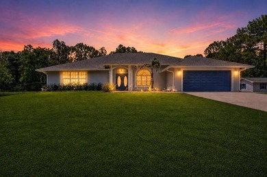 Set on a secluded 2.39-acre corner lot in the heart of - photo 3